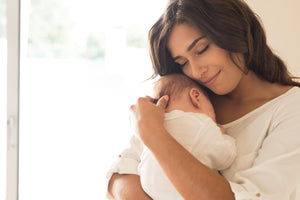 ovarium woman holding baby